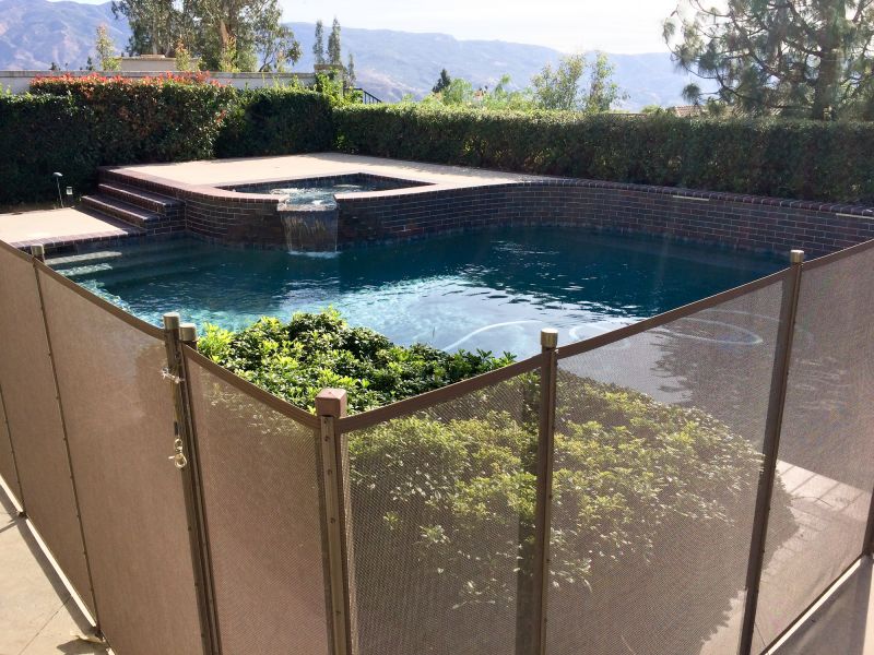 Mesh Fence Securing Pool Area